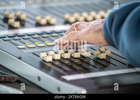 Man using audio mixing board at Blue Ridge Music Center Stock Photo