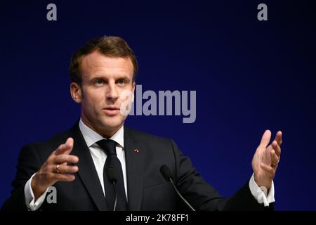 French President Emmanuel French President Emmanuel Macron delivers a speech during the Global forum on Artificial Intelligence (AI) for Humanity (GFAIH)  Stock Photo