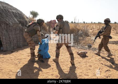 French soldiers of Operation Barkhane.  Operation Barkhane is an ongoing anti-insurgent operation in Africa's Sahel region, which commenced 1 August 2014. It consists of a 3,000-strong French force, which will be permanent and headquartered in -N'Djamena, the capital of -Chad. The operation has been designed with five countries, and former French colonies, that span the Sahel: -Burkina-Faso, -Chad, -Mali, -Mauritania and -Niger. These countries are collectively referred to as the 'G5 Sahel'. Stock Photo