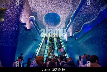 April 15 2022- One of the most beautiful metro stations in Naples with blue walls and very long escalators Stock Photo