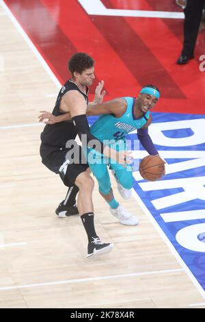 Brook Lopez   of  Milwaukee Bucks and   Devonte' Graham of  Charlotte Hornets   during the NBA Paris Game 2020 basketball match between Milwaukee Bucks and Charlotte Hornets on January 24, 2020 at AccorHotels Arena in Paris, France - Photo Laurent Lairys /MAXPPP Stock Photo