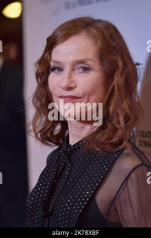 Isabelle Huppert arriving on the red carpet of the 70th Anniversary