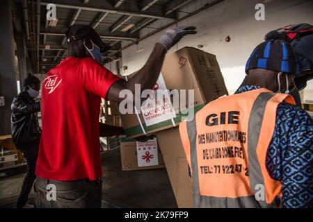 Senegal / Dakar / Dakar  -  China has decided to make a contribution to help Senegal in the fight against the Corona virus by offering medical equipment.The second batch of medical aids offered by the Chinese government at Blaise Diagne international airport in Dakar, Senegal. Stock Photo