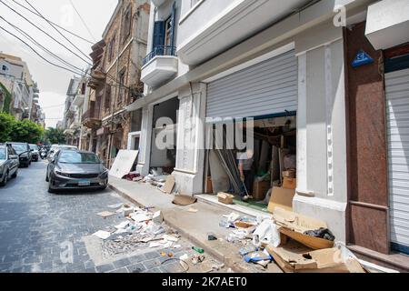 ©CAROLINE BLUMBERG/MAXPPP - BEIRUT, August 13, 2020 - A man sweeps his garage as the ceiling threatens to collapse, in Beirut, Lebanon, August 13 2020. A week after the explosions that ravaged Beirut, Lebanese Prime Minister announced the resignation of his government. Stock Photo