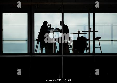 Aurelien Morissard / IP3; People are chatting on a terrace at the top of the Philippe Chatrier court of the French Open tennis tournament at Roland Garros in Paris, France, 3rd October 2020. Stock Photo