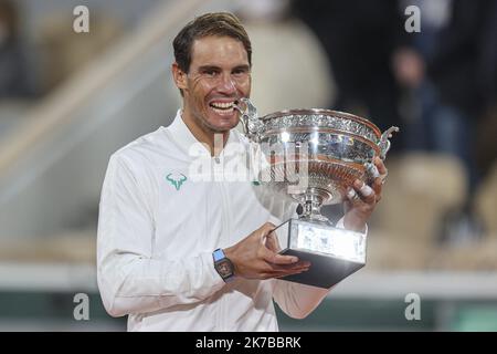 ©Sebastien Muylaert/MAXPPP - Rafael Nadal of Spain with the winners trophy after his victory against Novak Djokovic of Serbia in the Singles Final on Court Philippe-Chatrier during the French Open Tennis Tournament at Roland Garros in Paris, France. 11.10.2020 Stock Photo