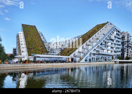 Copenhagen, Denmark - Sept 2022: View of the 8 House building, designed by Danish architectural firm Bjarke Ingels Group in Orestad District Stock Photo