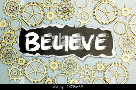 believe word written on wood block. believe text on table, concept. Stock Photo