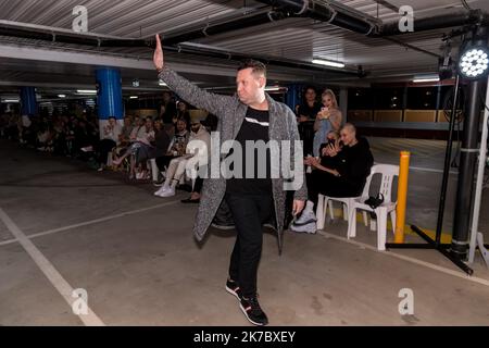 Melbourne, Australia, 14 October, 2022. Designer Justin Cassin at his Melbourne Fashion Week Runway event that was staged in a car park in the Docklands, Melbourne, Australia.at the Justin Cassin Melbourne Fashion Week event staged in a car park in the Docklands, Melbourne, Australia. Credit: Michael Currie/Speed Media/Alamy Live News Stock Photo
