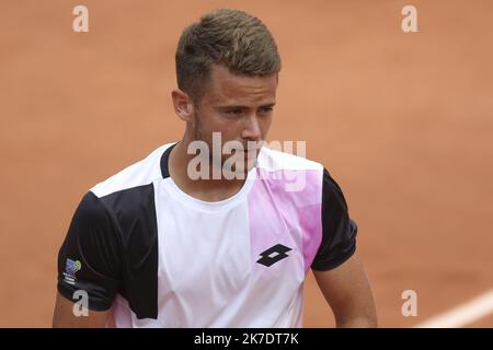 ©Sebastien Muylaert/MAXPPP - Enzo Couacaud of France reacts during his mens second round match against Pablo Carreno Busta of Spain during day four of the 2021 French Open at Roland Garros in Paris, France. 02.06.2021 Stock Photo