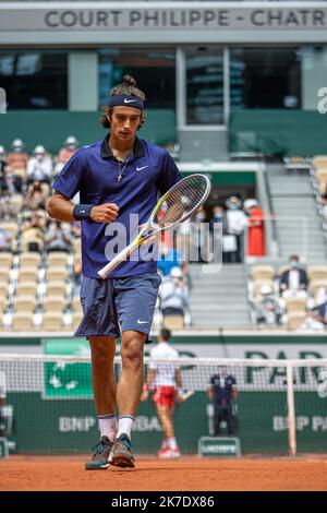 Aurelien Morissard / IP3 ; Lorenzo MUSETTI of Italy reacts during the men's single against Novak DJOKOVIC of Serbia on the fourth round of the French Open tennis tournament at Roland Garros in Paris, France, 7 June 2021. Stock Photo