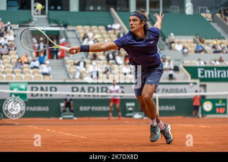 Aurelien Morissard / IP3 ; Lorenzo MUSETTI of Italy plays a ball during the men's single against Novak DJOKOVIC of Serbia on the fourth round of the French Open tennis tournament at Roland Garros in Paris, France, 7 June 2021. Stock Photo