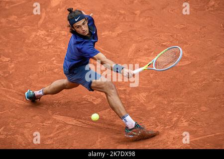 Aurelien Morissard / IP3 ; Lorenzo MUSETTI of Italy plays a ball during the men's single against Novak DJOKOVIC of Serbia on the fourth round of the French Open tennis tournament at Roland Garros in Paris, France, 7 June 2021. Stock Photo