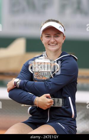 ©Sebastien Muylaert/MAXPPP - Match Winner Barbora Krejcikova of Czech Republic holds the Winners Trophy after the Women’s final on day fourteen of the 2021 French Open at Roland Garros in Paris, France. 12.06.2021 Stock Photo