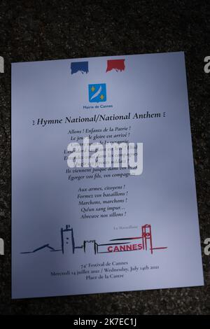 ©Pierre Teyssot/MAXPPP ; Cannes Film Festival 2021. 74th edition of the 'Festival International du Film de Cannes' under Covid-19 outbreak on 14/07/2021 in Cannes, France. Celebrity Sightings A flyer with the national French Anthem, Marseillaise. Â© Pierre Teyssot / Maxppp  Stock Photo