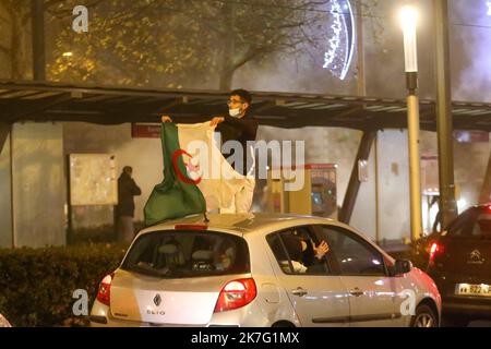 ©PHOTOPQR/VOIX DU NORD/Thierry Thorel ; 18/12/2021 ; Roubaix - suite a la victoire de l'equipe de foot algerienne , des debordements ont eu lieu dans les rues de la ville - Le 18/12/ 2021 dec 18th 2021. Atmosphere in Roubaix, France during the finale of the Fifa Arab cup between Tunisia and Algeria Stock Photo