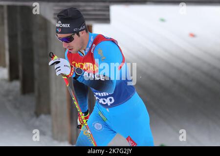 ©Pierre Teyssot/MAXPPP ; Tour de ski - FIS Cross Country Skiing World Cup 2022 under Covid-19 Pandemic. Lago di Tesero, Val Di Fiemme, Italy on January 3, 2022. In action Martin Collet (FRA). Â© Pierre Teyssot / Maxppp  Stock Photo