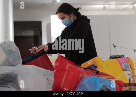 ©Pierre Teyssot/MAXPPP ; Ukraine Russia Conflict - Ukraine's Mobilization in Europe. Pergine Valsugana, Italiy on March 1, 2022. Volunteers and Ukrainians from Kharkiv and Lviv living in Italy prepare essential needs, food and medicines to send in Ukraine to help their country after 5 days of War against Russia. An Ukrainian girl Veronica from Kharkiv prepares clothes. Â© Pierre Teyssot / Maxppp - Crossing the border into Medyka to go to Ukraine, some people hope to find a weapon and join the front.  Stock Photo