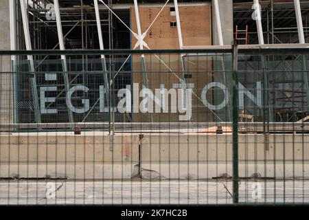 Construction fence in front of Eglinton subway station, Toronto, Ontario, Canada. Stock Photo