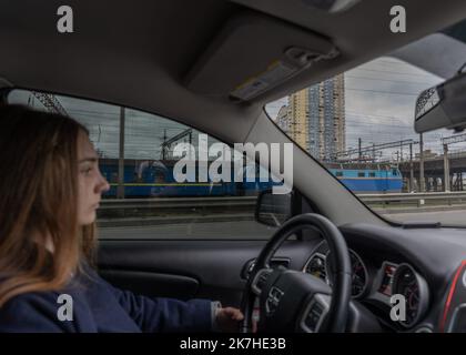 ©Sadak Souici / Le Pictorium/MAXPPP - Kiev 19/04/2022 Sadak Souici / Le Pictorium - 19/4/2022 - Ukraine / Kiev / Kiev - 'Mes grands parents sont morts la-bas, mais je sais que mes parents sont vivants, un voisin me l'a dit.' Nastia, 26 ans, est chargee de communication pour l'Ukrzaliznytsia. Fille unique, la quasi-totalite de sa famille est a Mariupol. 'Les jours sont devenus tres longs, et je n'arrive meme plus a me souvenir d'en quoi consistait mon travail avant la guerre.' Kyiv, Ukraine: 18 avril 2022 / 19/4/2022 - Ukraine / Kyiv / Kyiv - 'My grandparents died there, but I know my parents a Stock Photo