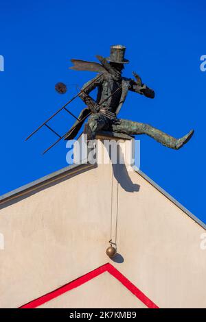 Chimney sweeper sculpture on roof, Klaipeda, Eponymous County, Lithuania Stock Photo