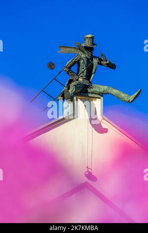 Chimney sweeper sculpture on roof, Klaipeda, Eponymous County, Lithuania Stock Photo