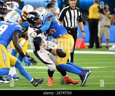 Inglewood, USA. 17th Dec, 2021. Los Angeles Chargers Joshua Palmer catches  the ball in front of Chiefs cornerback Mike Hughes (R) at SoFi Stadium on  Thursday, December 16, 2021 in Inglewood, California.