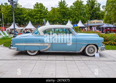 BADEN BADEN, GERMANY - JULY 2019: blue white CHEVROLET BEL AIR sport coupe 1953, oldtimer meeting in Kurpark. Stock Photo
