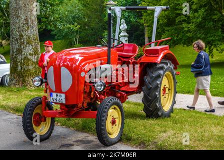 BADEN BADEN, GERMANY - JULY 2019: red PORSCHE JUNIOR retro diesel tractor 1952 1963, oldtimer meeting in Kurpark. Stock Photo