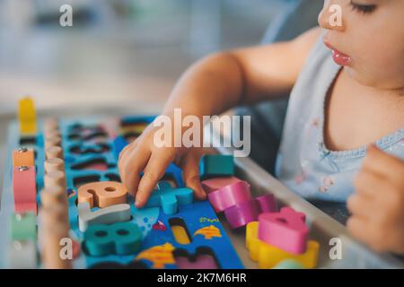 girl plays educational games,. High quality photo Stock Photo - Alamy