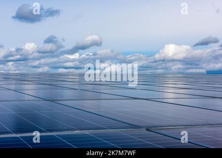 Sun panels, solar collectors, solar cells and blue sky Stock Photo