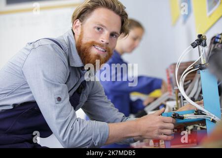 male engineer checking the electrical system Stock Photo