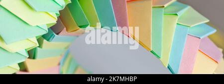 Panoramic origami background, parametric structures of colorful paper sheets, close up photo with selective focus Stock Photo