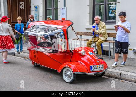 BADEN BADEN, GERMANY - JULY 2019: red MESSERSCHMITT KR200 Cabin Scooter opened 1955 1964, oldtimer meeting in Kurpark. Stock Photo