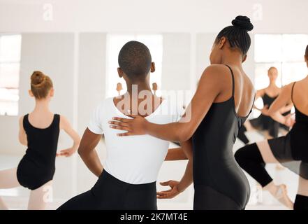 Dancers come and go in the twinkling of an eye. a group of ballet dancers practicing a routine in a dance studio. Stock Photo
