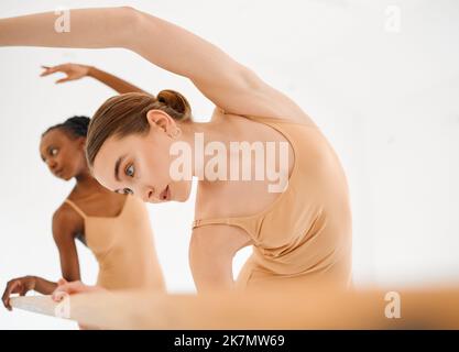 I want to dance with you forever. a group of ballet dancers practicing a routine. Stock Photo