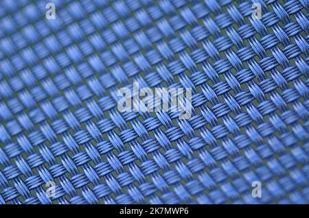 A blue synthetic rattan texture weaving background-used on outdoor garden furniture Stock Photo