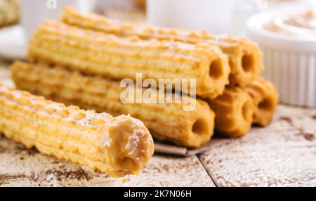 Churros, Typical Sweet From Brazil And America, Fried And Stuffed With ...