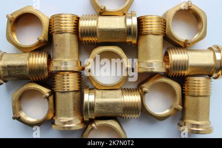 Sanitary And Plumbing Items. Brass Fitting And Nuts For Water Meter Connection Texture Background Stock Photo