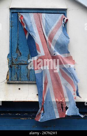 A battered union jack flag Stock Photo