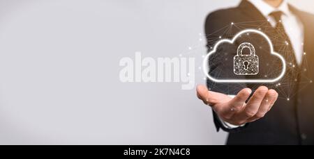Business man hold,holding cloud computing data and security on global networking,Padlock and cloud icon. Technology of business.Cybersecurity and info Stock Photo