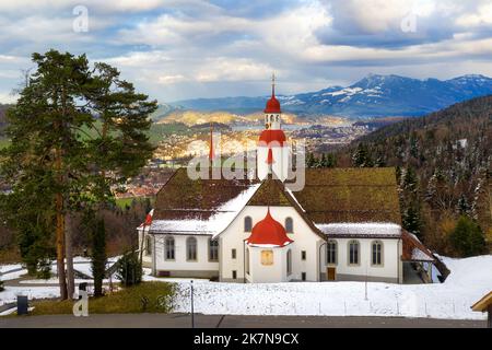 Hergiswald church in swiss Alps mountains, high above Lucerne city, is an important historical pilgrimage destination in Switzerland Stock Photo