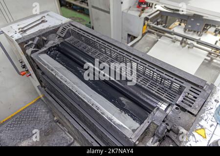 Black Print Ink Rollers at Offset Printing Machine Stock Photo - Alamy