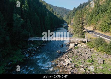 Aerial view of Pack Bridge Across the Lochsa River, providing recreational access to the Selway-Bitterroot Wilderness, Lolo, Idaho Stock Photo