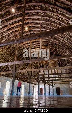 Bruere Allichamps (central France): the Noirlac Abbey, Cistercian monastic complex. Interior of the dormitory of the lay brothers with its barrel vaul Stock Photo