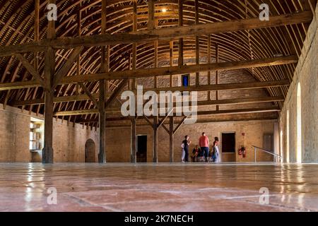 Bruere Allichamps (central France): the Noirlac Abbey, Cistercian monastic complex. Interior of the dormitory of the lay brothers with its barrel vaul Stock Photo