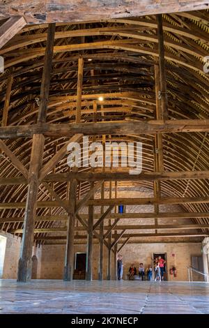 Bruere Allichamps (central France): the Noirlac Abbey, Cistercian monastic complex. Interior of the dormitory of the lay brothers with its barrel vaul Stock Photo