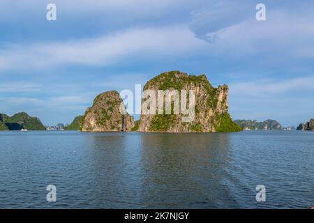Beautiful island landscape of Halong Bay the UNESCO world heritage site in Vietnam. The bay features thousands of limestone karsts in various shapes a Stock Photo