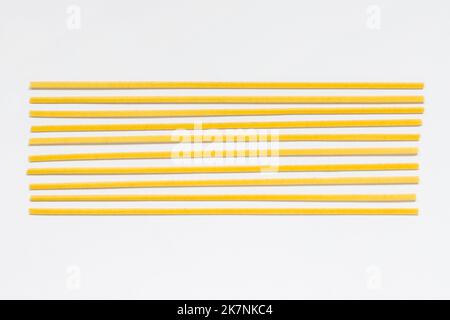 Durum fettuccine pasta on white background. Noodles Stock Photo