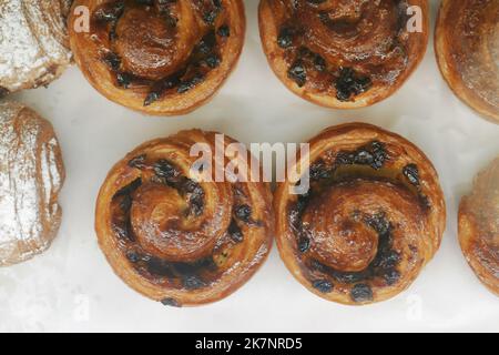 close up cinnamon danish roll on table  Stock Photo